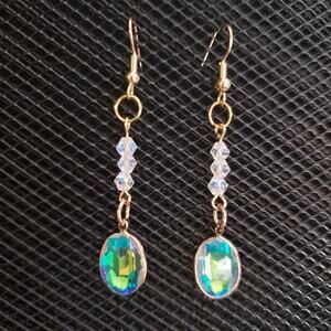 Gold and oval iridescent glass crystal earrings